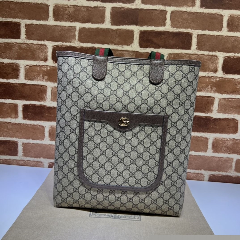 G*u*i shopping bags